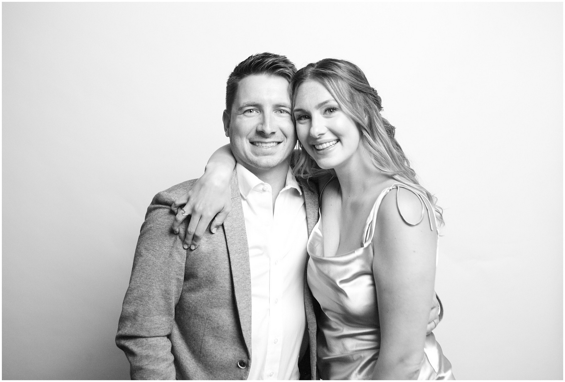 A newlywed couple smile together